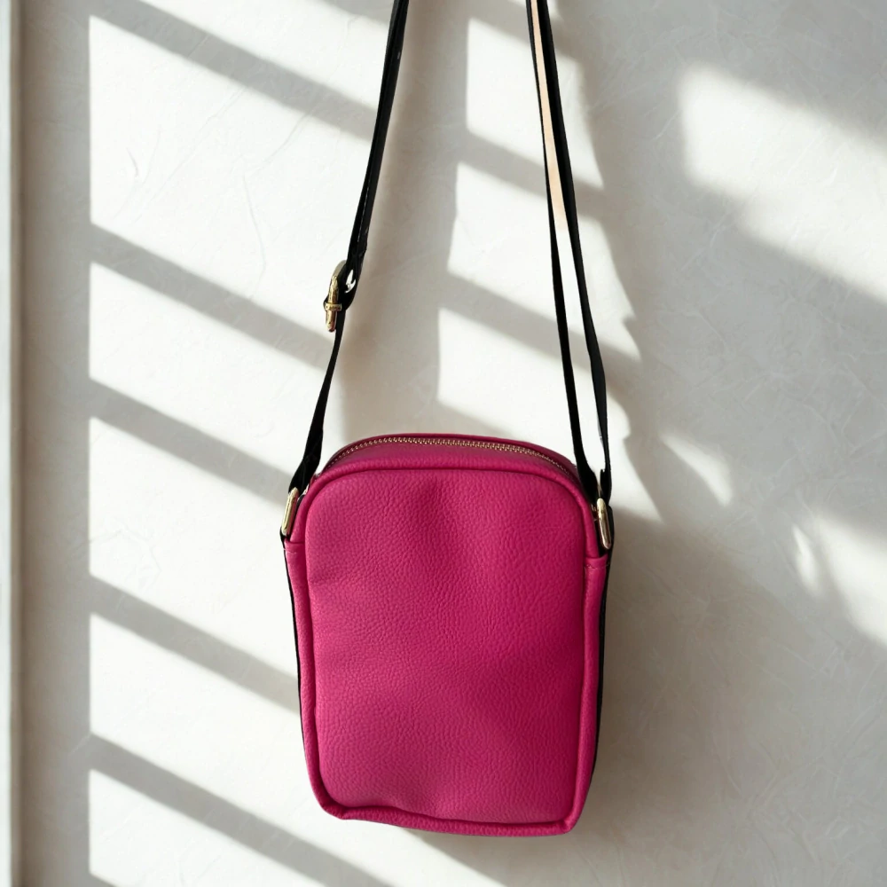 Malá ružová jednoduchá crossbody kabelka Laura Biaggi 22x16x8