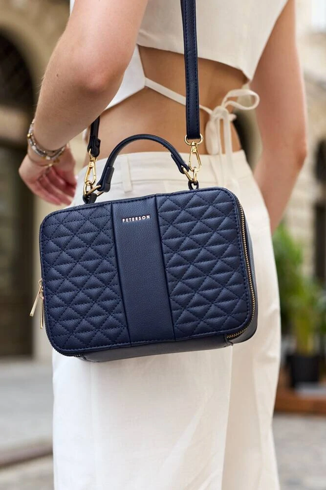 Malá prešívaná tmavomodrá elegantná messenger kabelka Peterson 23x17x10